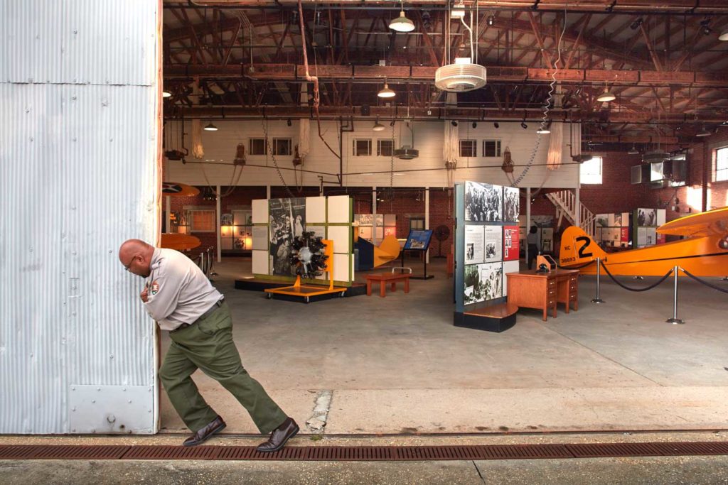 Moton Field, home of the Tuskegee Airmen National Historic Site. 
Hangar One with historic displays inside. Site Manager Tim Sinclair opens the hangar doors.